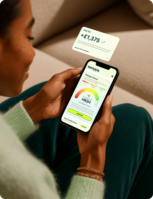 a woman looking at the swoppa dashboard one her phone